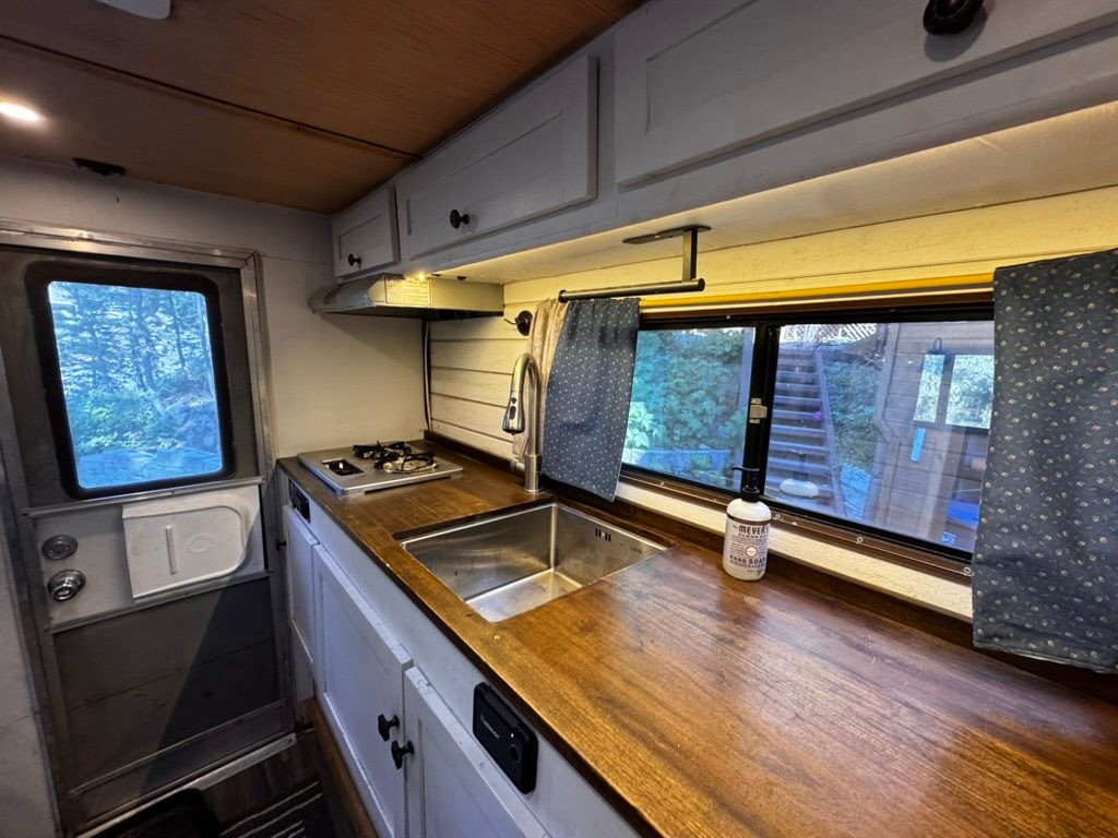 Galley — solid wood counter, deep sink